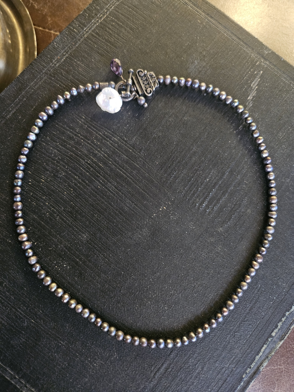 Hand Crafted Iridescent Black Pearl Necklace with Amethyst Charm
